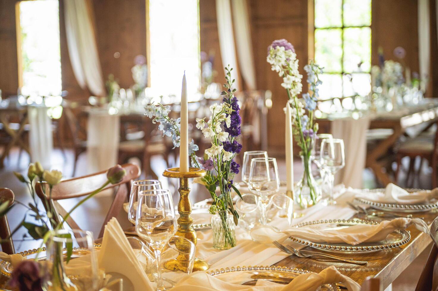 Elegant dining table with flowers and candles photo