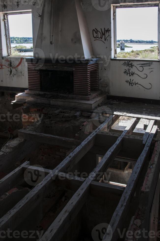 Detail of a view of a house in ruins, where the floor has disappeared photo
