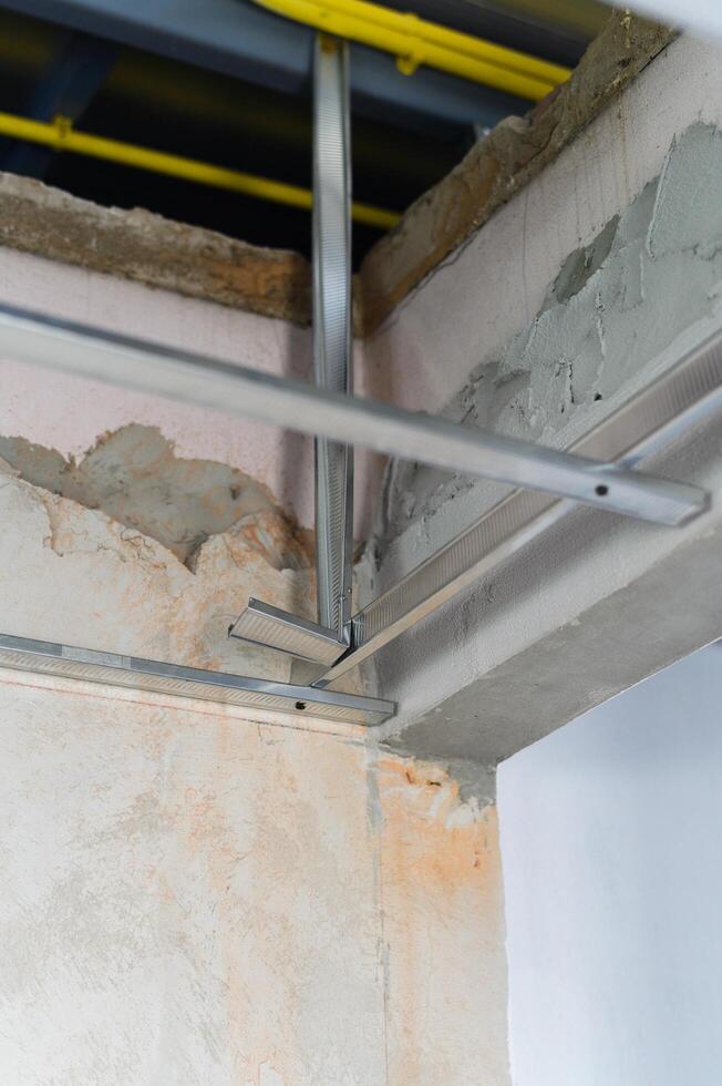 Sturdy aluminum framework provides essential framing for interior renovation project, showcasing diligent construction effort toward progress photo