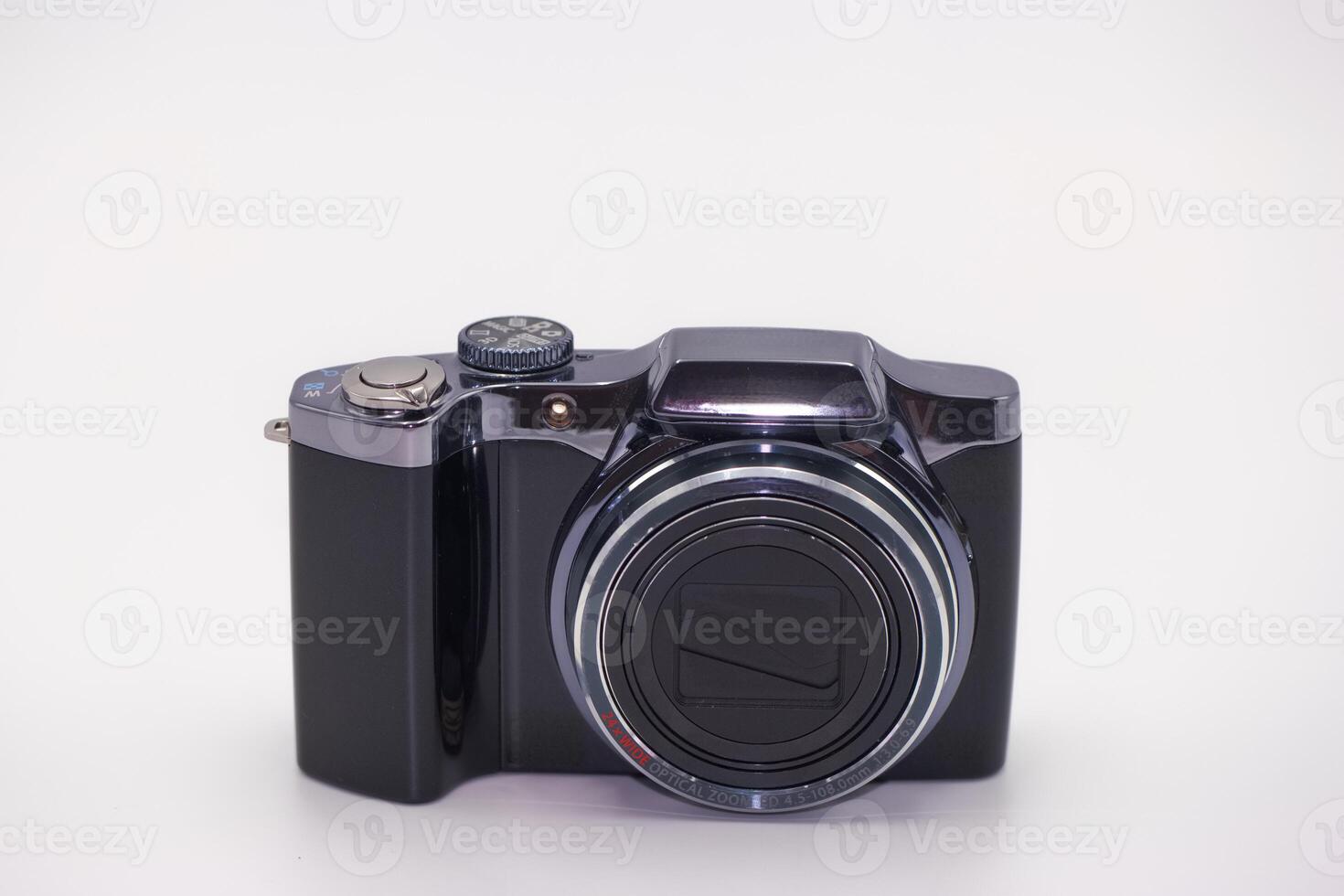 Compact digital camera with sleek design, ready for capturing memorable moments in various settings photo