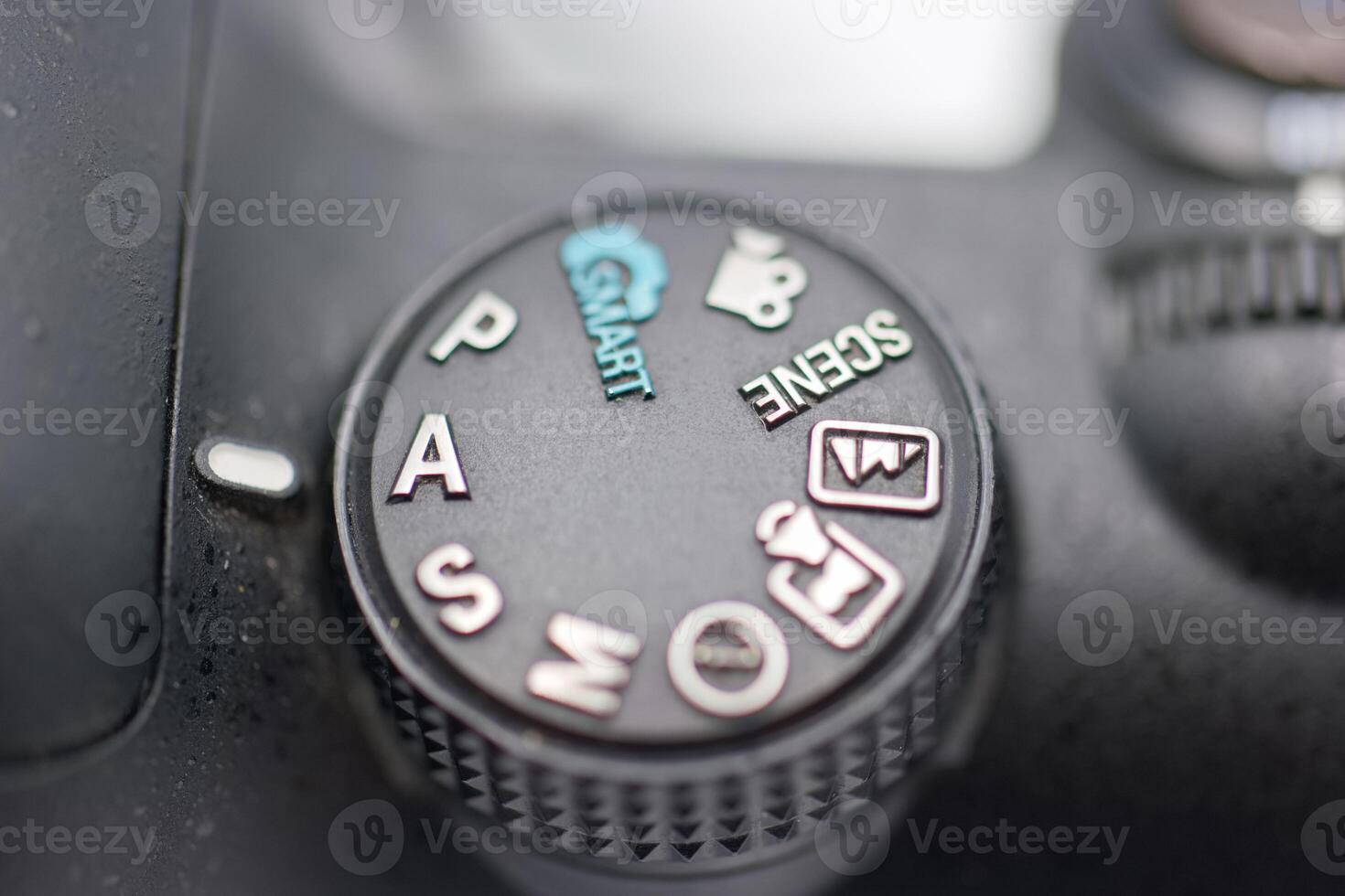 Camera settings dial showcasing various modes for photography in close up view photo