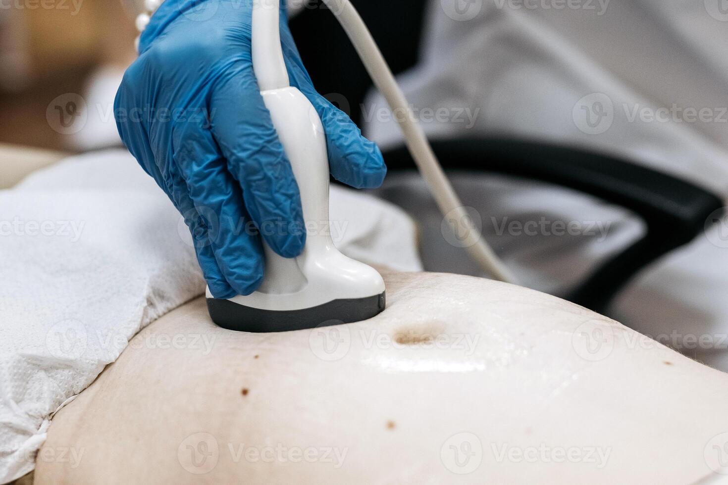 Close-up ultrasound of a pregnant woman. Concept prenatal diagnostics and maternal care. photo