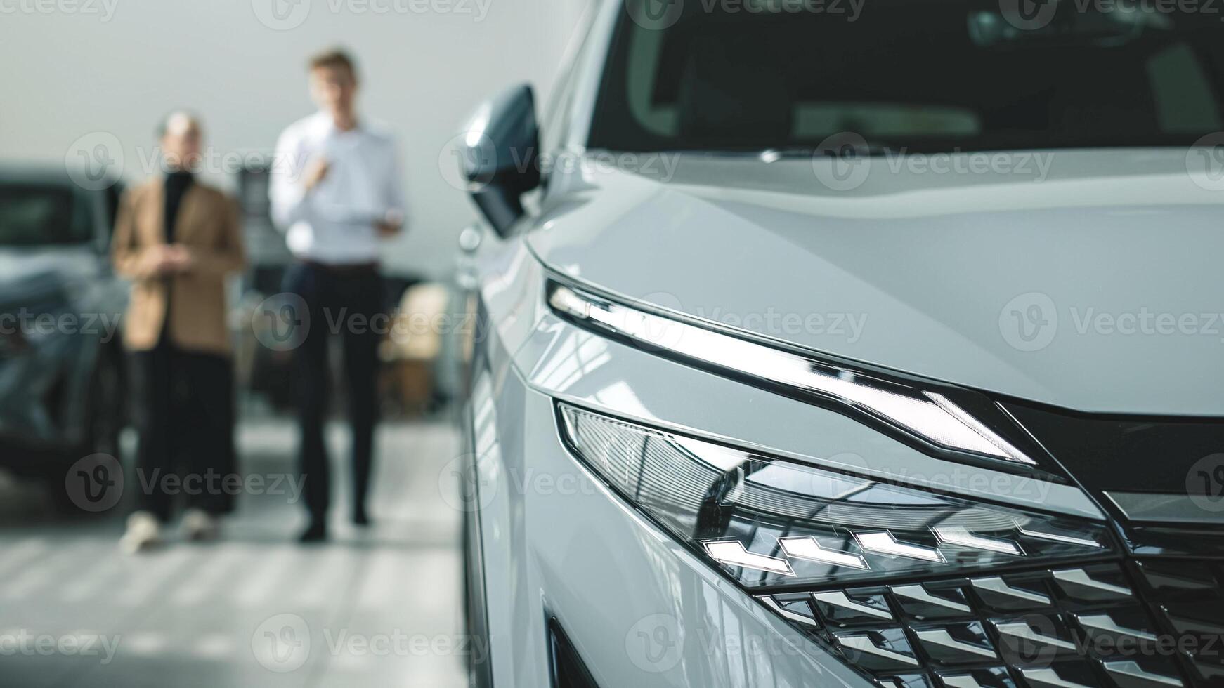 Consultation with the seller when buying a new car. The concept of a confidential dialogue between the buyer and the consultant, the process of making a decision to buy a car. photo
