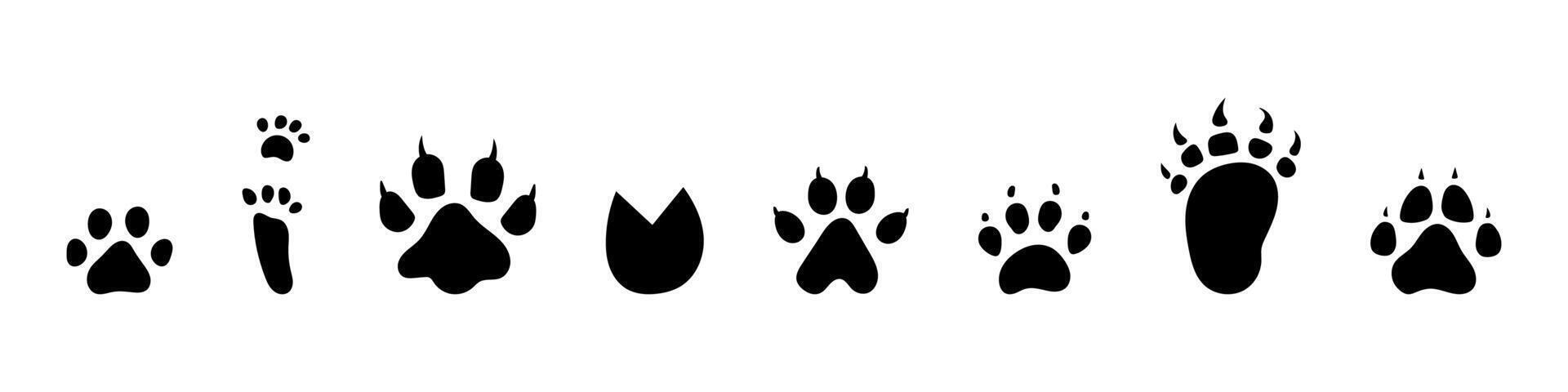 set of animal footprints. Icon collection with animal footsteps tracks. Paw trace in black silhouette. Animal feet collection. vector