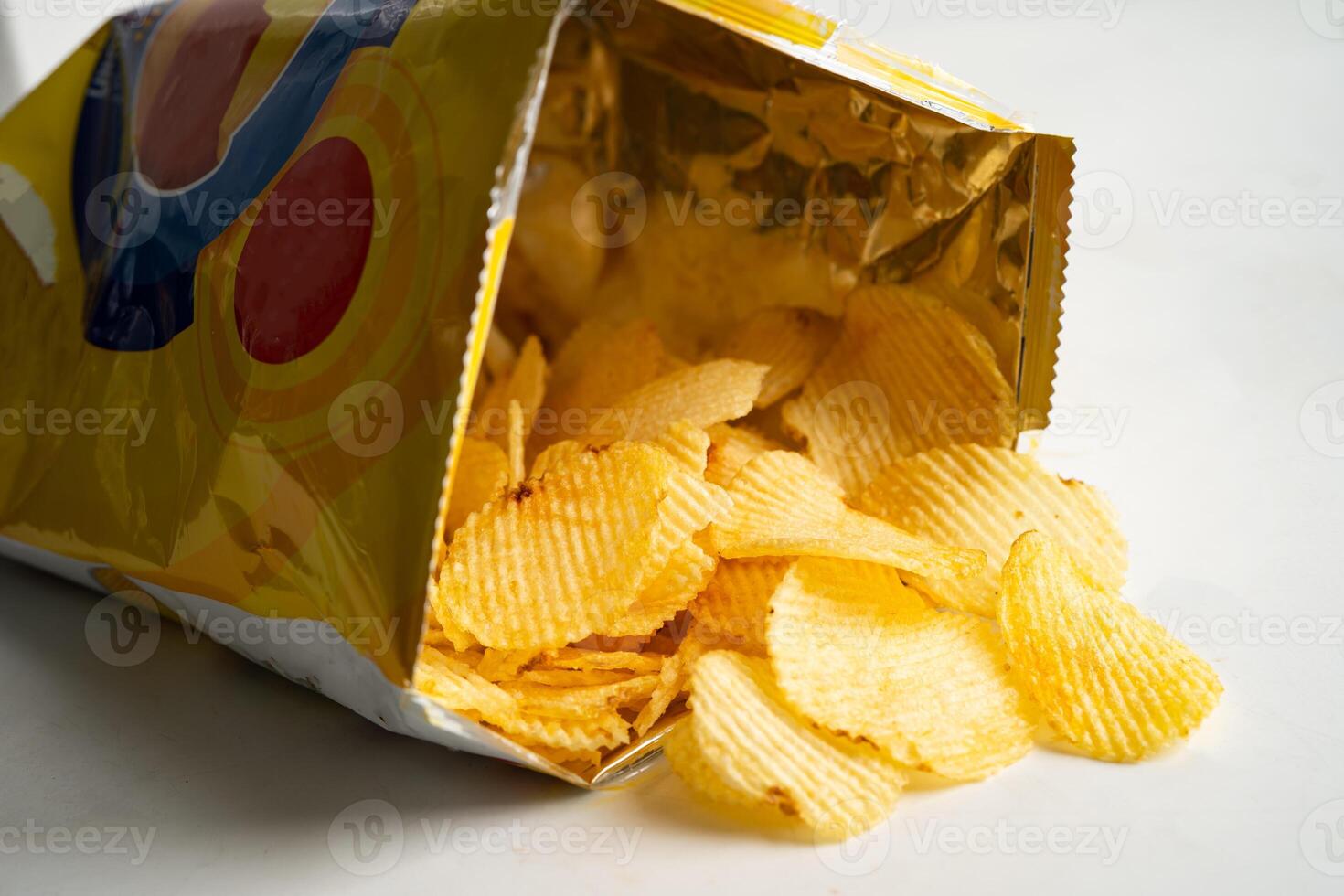 Potato chips delicious BBQ seasoning spicy for crips, thin slice deep fried snack fast photo