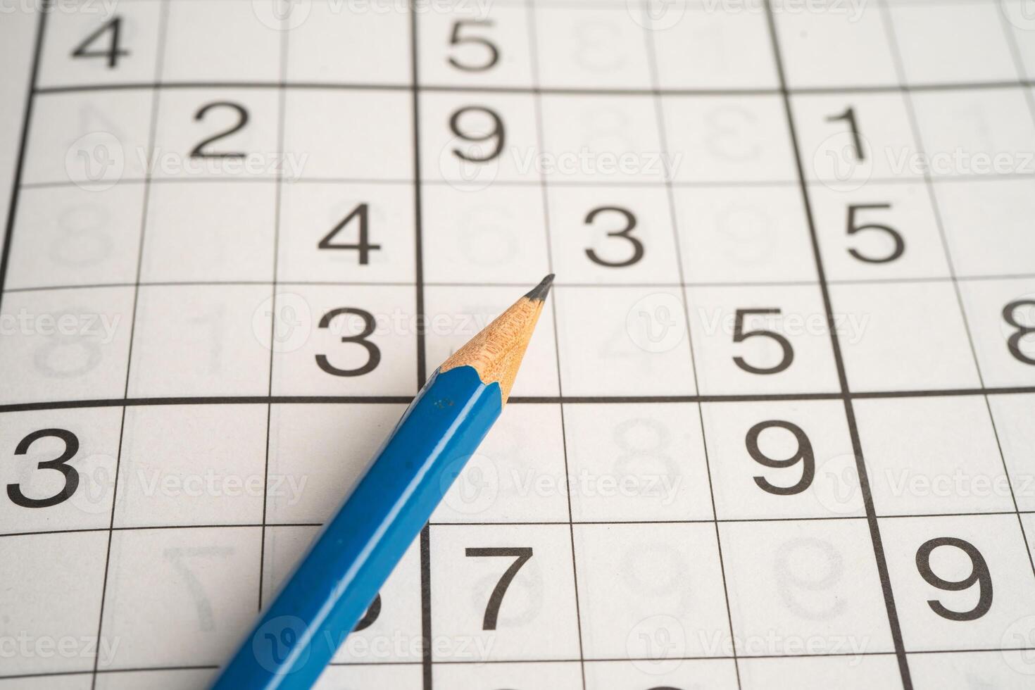 Sudoku puzzle game playing challenge brain. photo