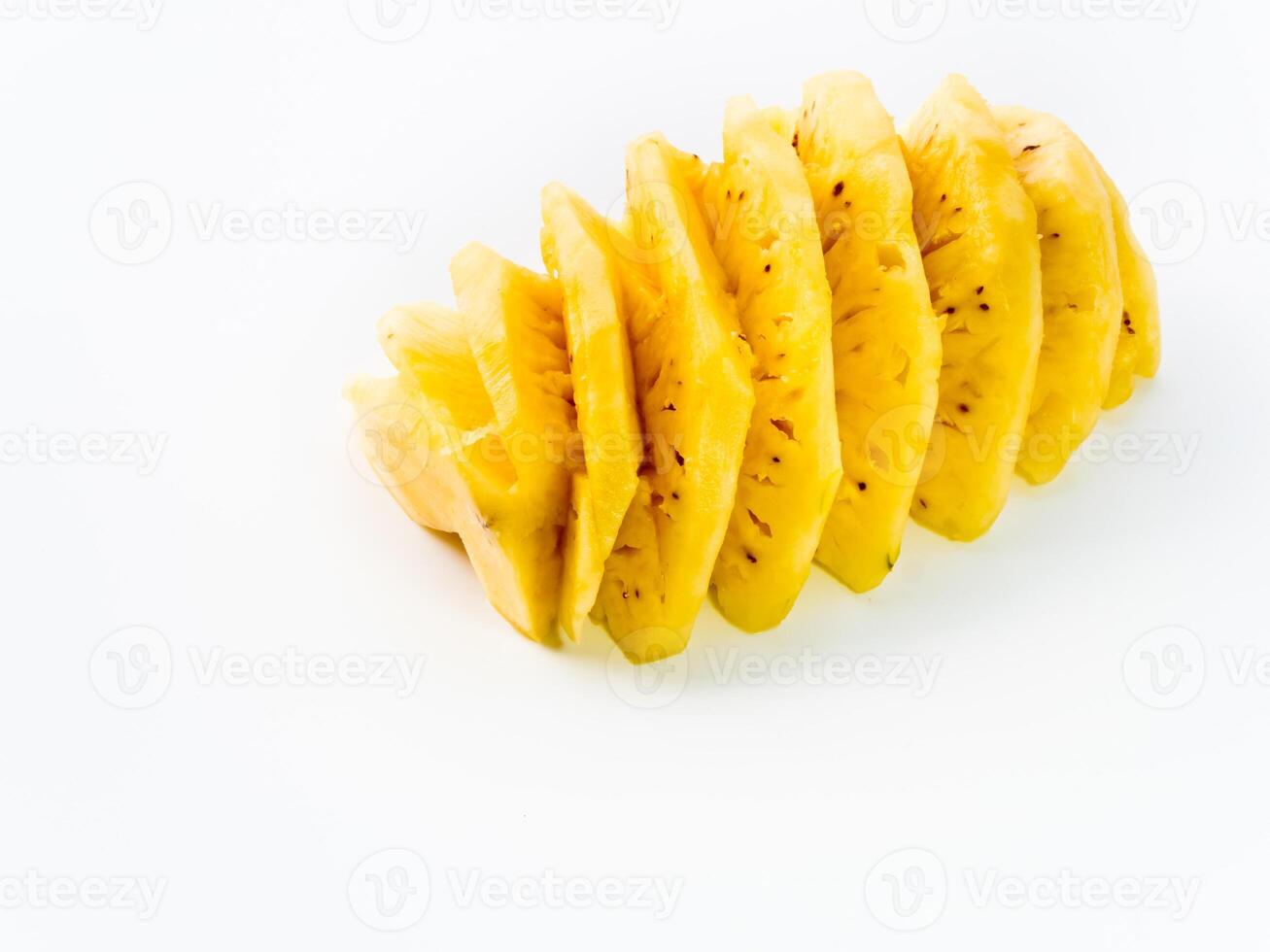 Pineapple, peeled and cut in half photo