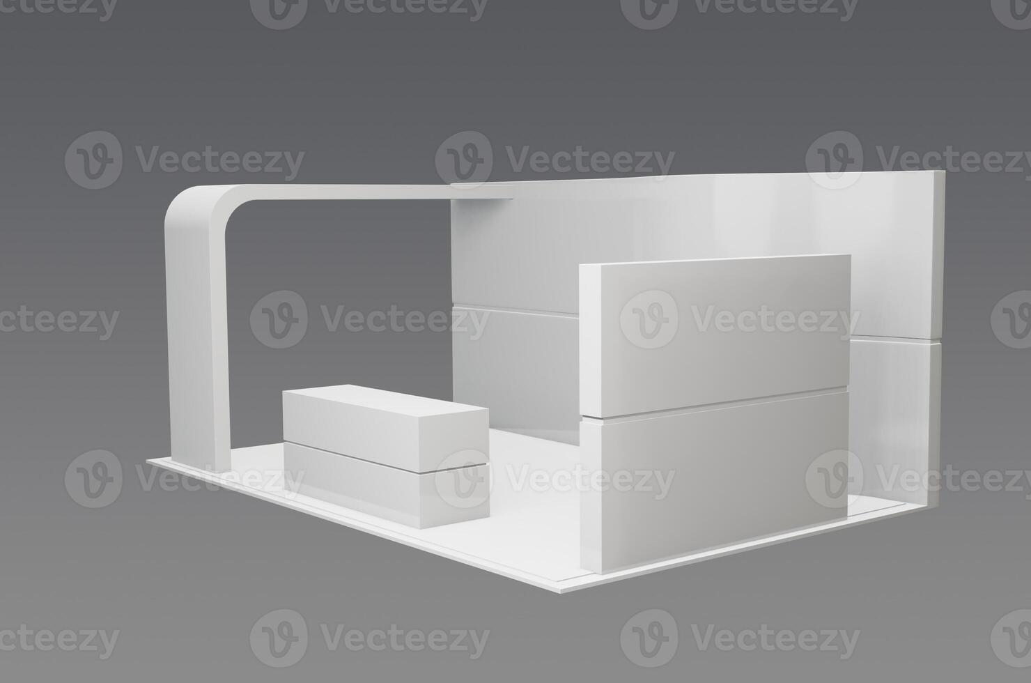 A white display booth with a table and chair photo