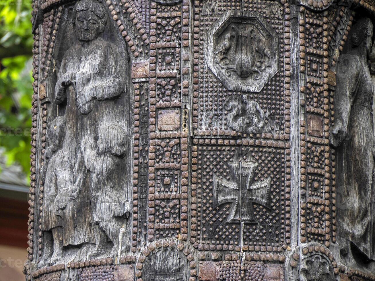 Nagelsaule wood column in Mainz Germany, detail close up erected during World War I as part of a German fundraising and propaganda campaign photo