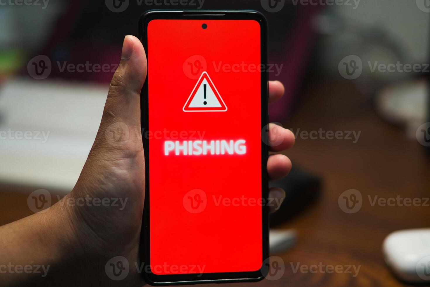 Mobile Phone Displaying Phishing Alert Message as a Cyber Security Warning photo