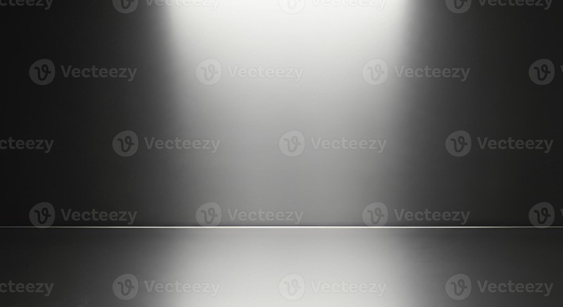 Dark gray studio background with bright light spotlight Clean empty space photo