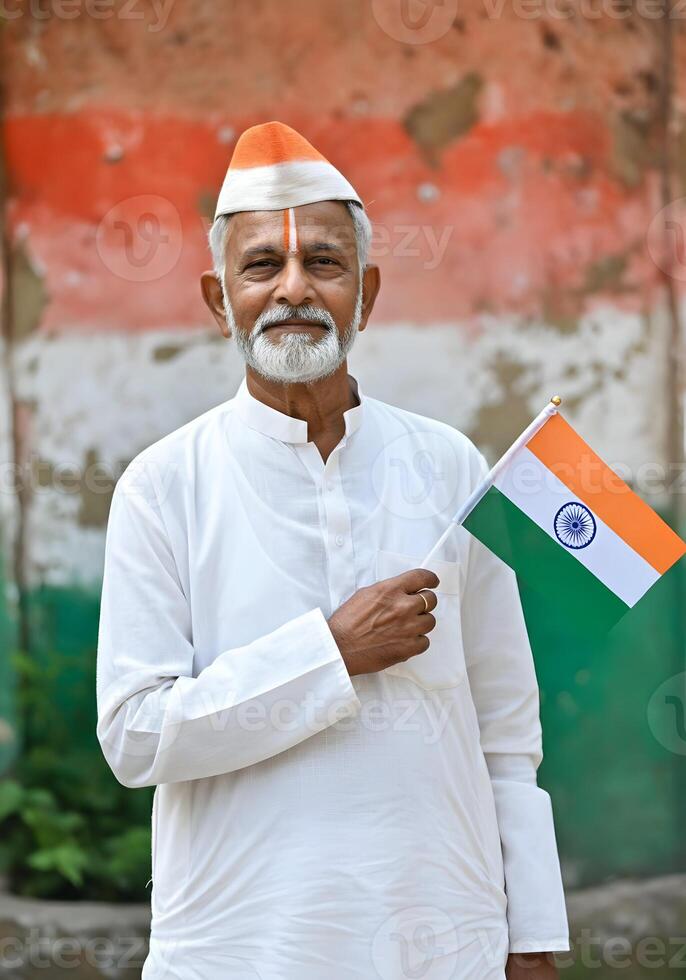 Indian Independence Day Greeting Advertisement With Elderly Indian Man Honoring Freedom with Flag photo