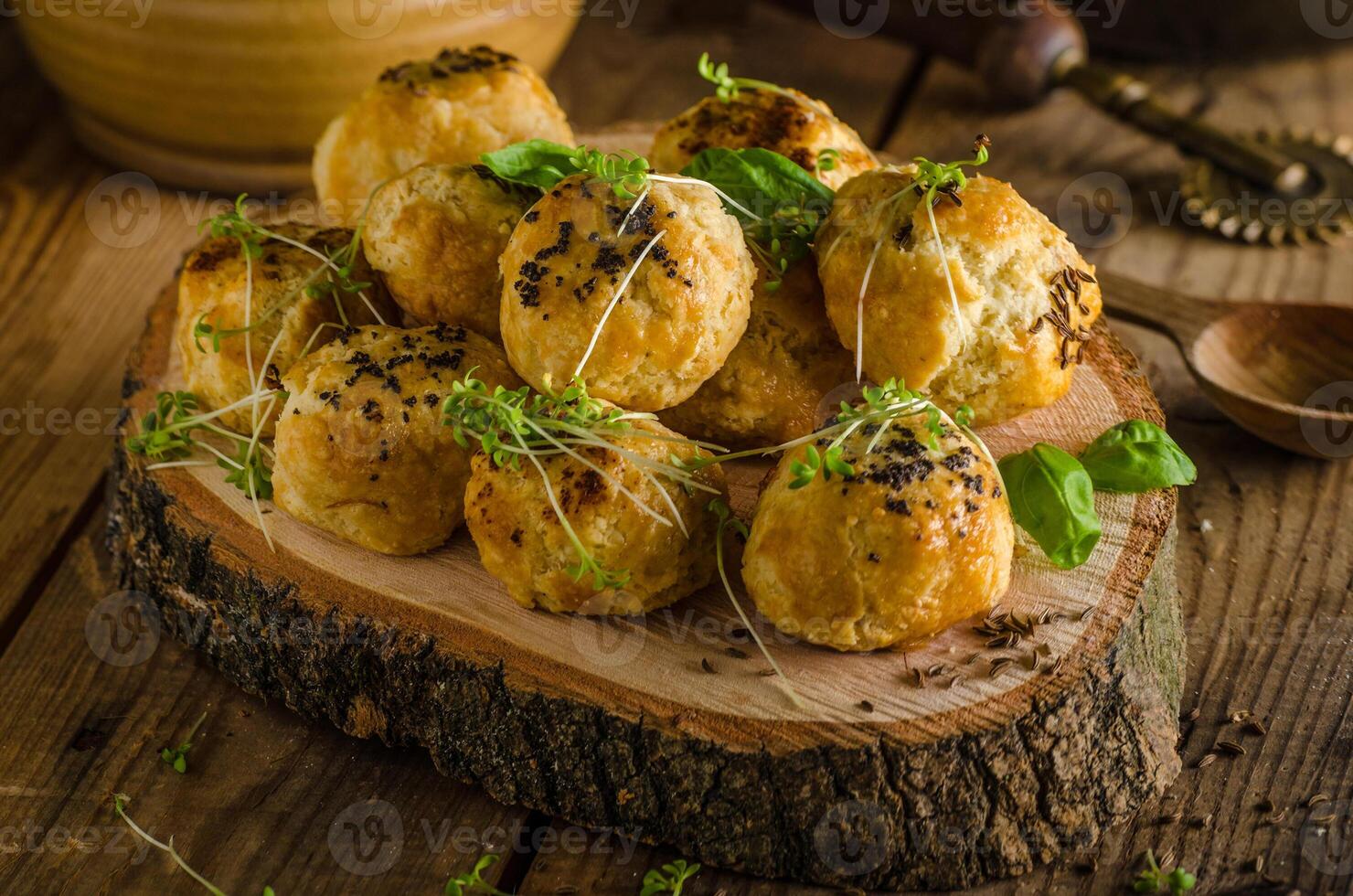 Savory bites with herbs on wood photo