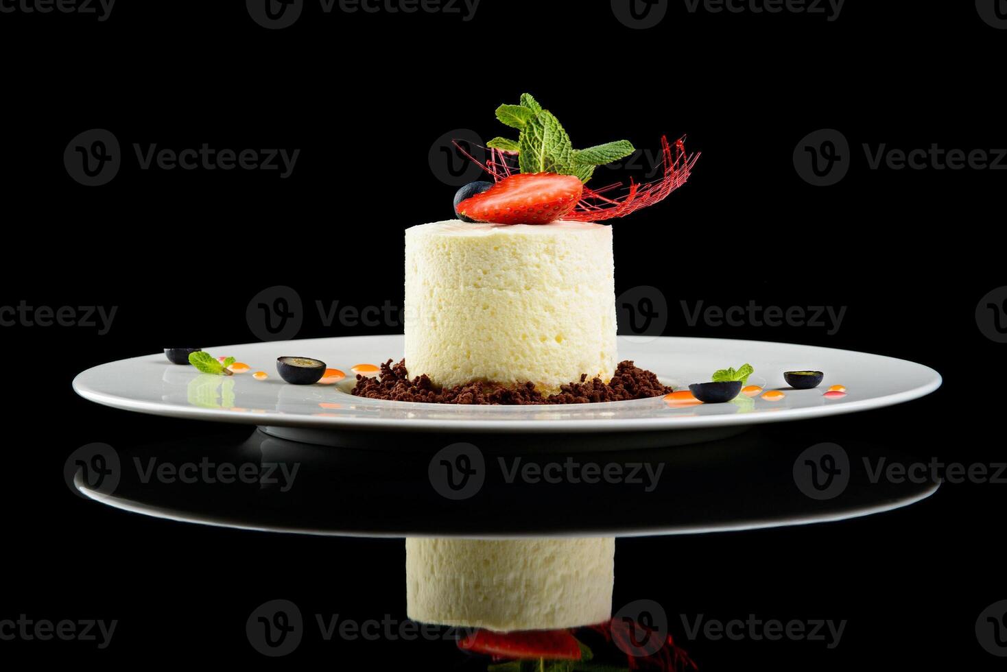 dessert on isolated black with reflectio photo