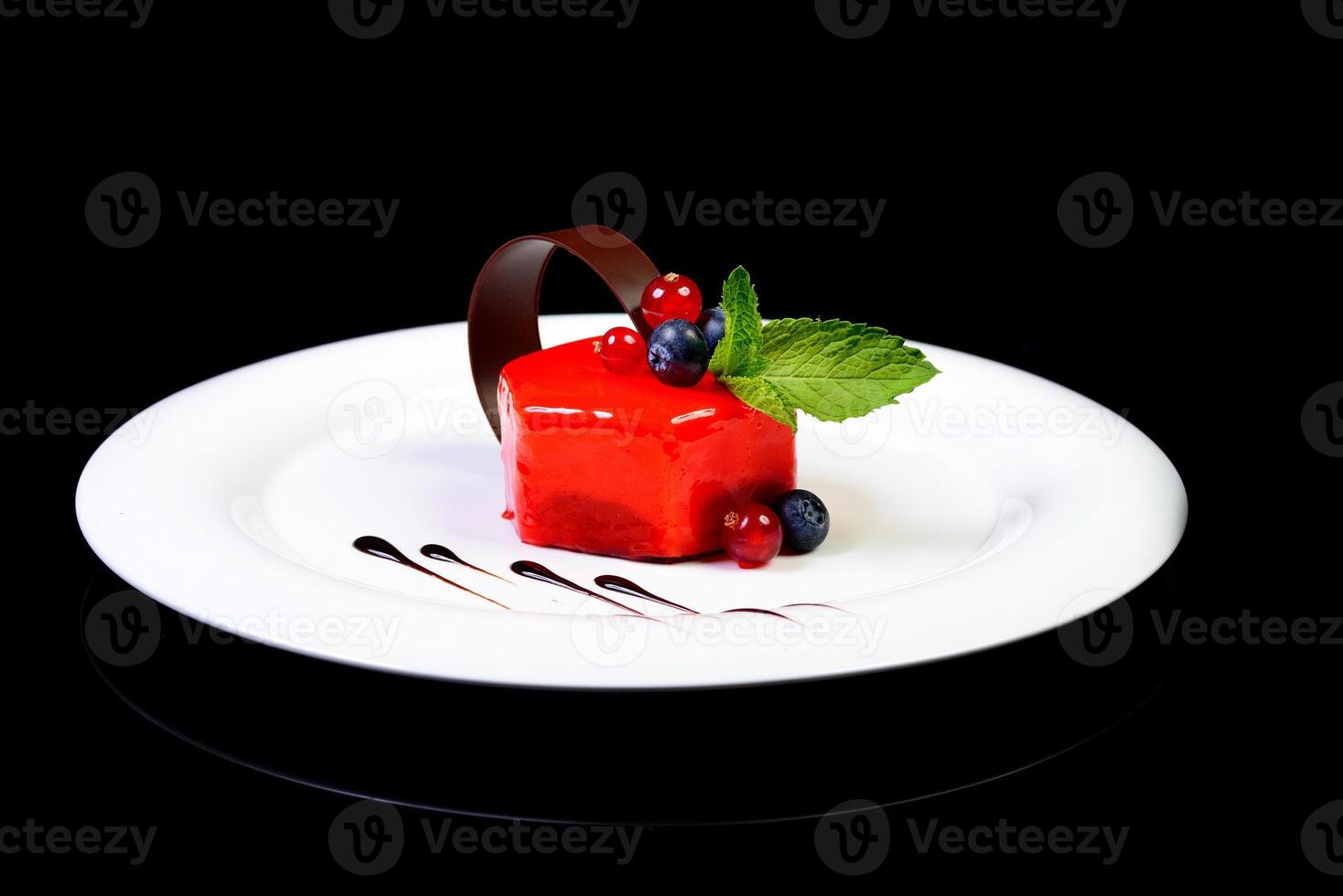 dessert on isolated black with reflection photo