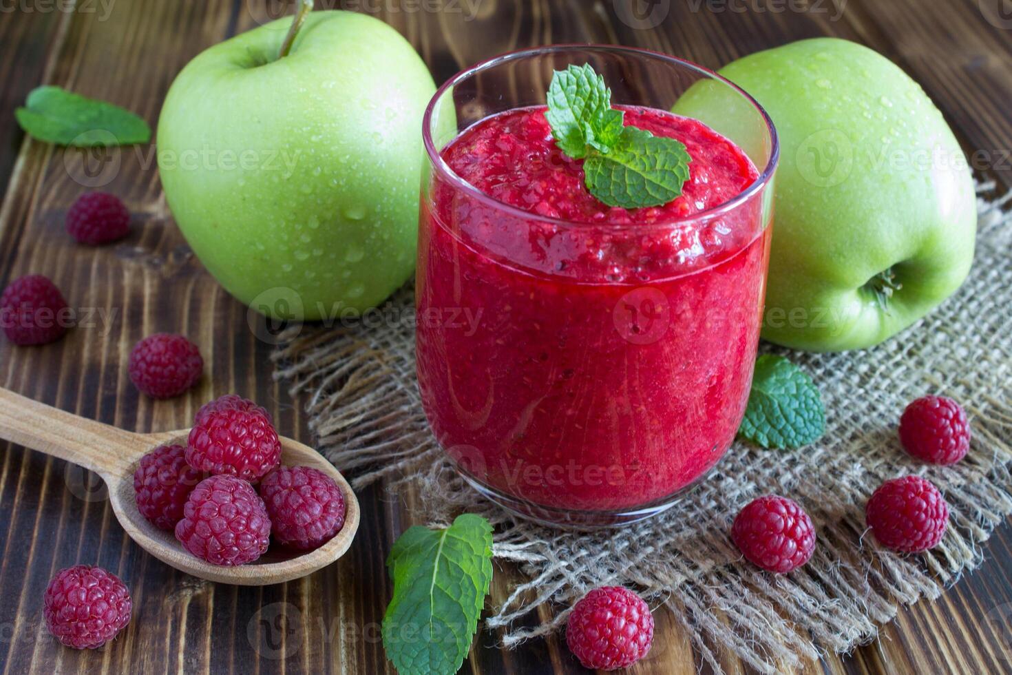 Raspberry apple smoothie with mint leaves photo