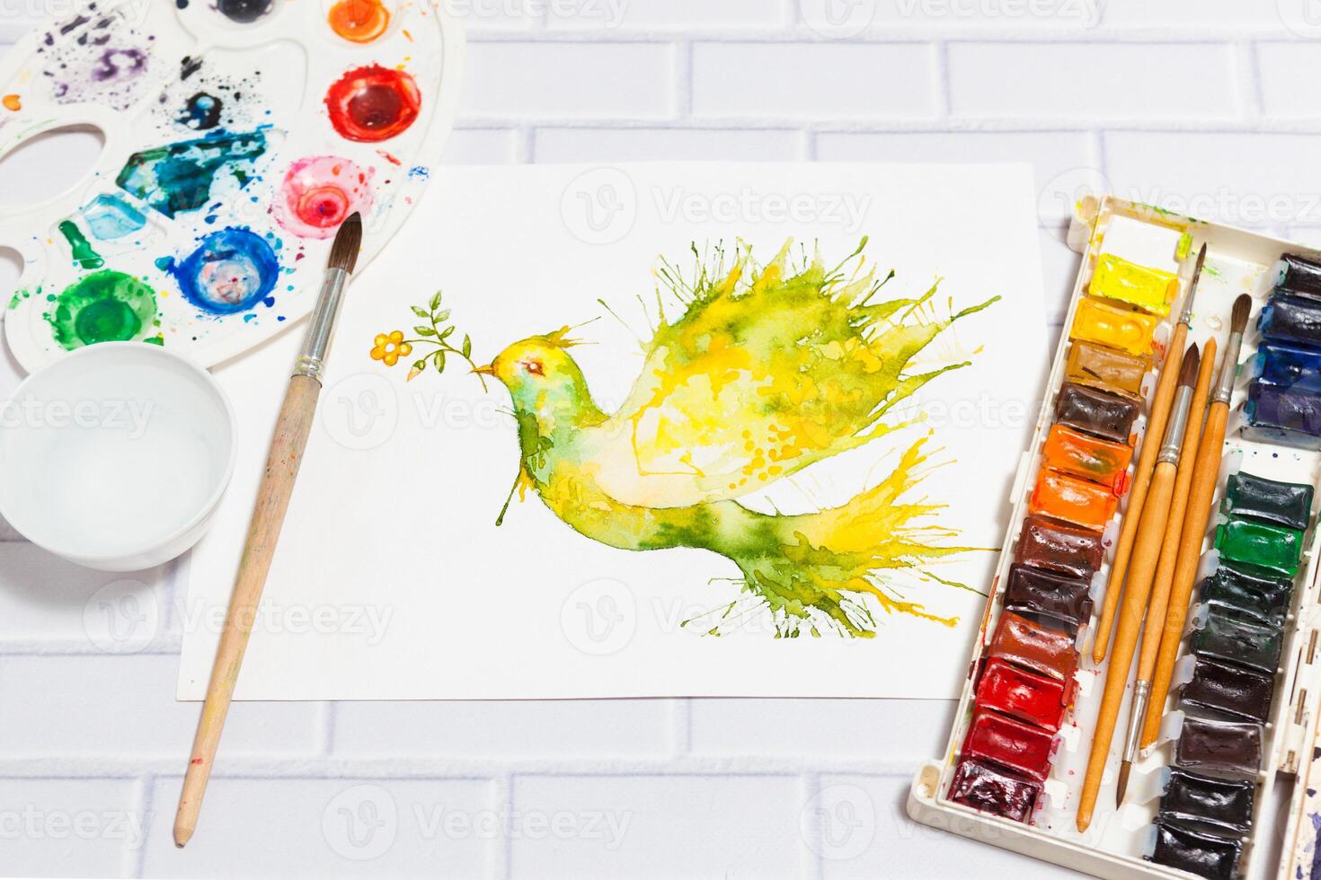 Watercolor Sketch of Green Dove And Paints photo