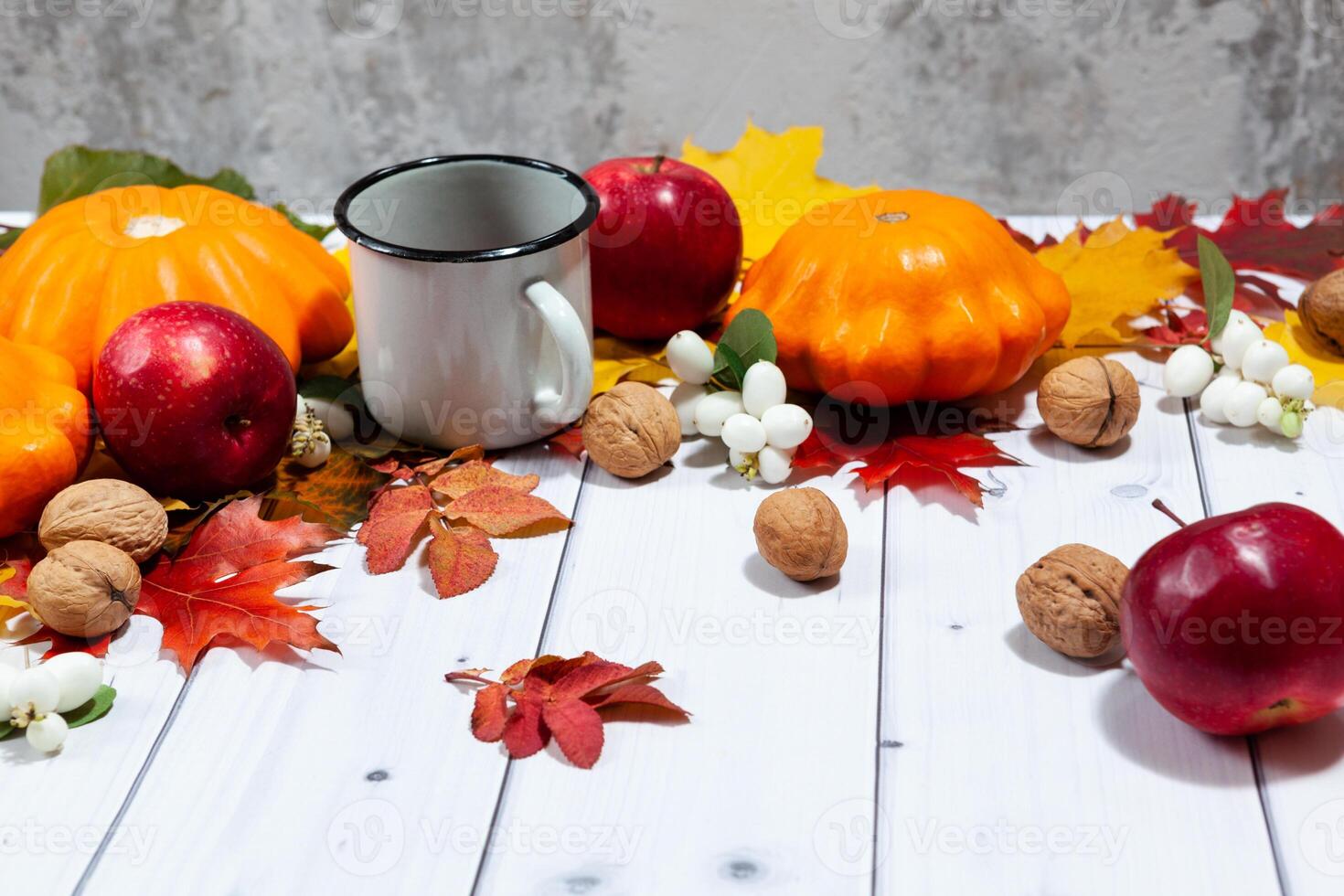 Autumn perspective background with pumpkins,apples and tea photo