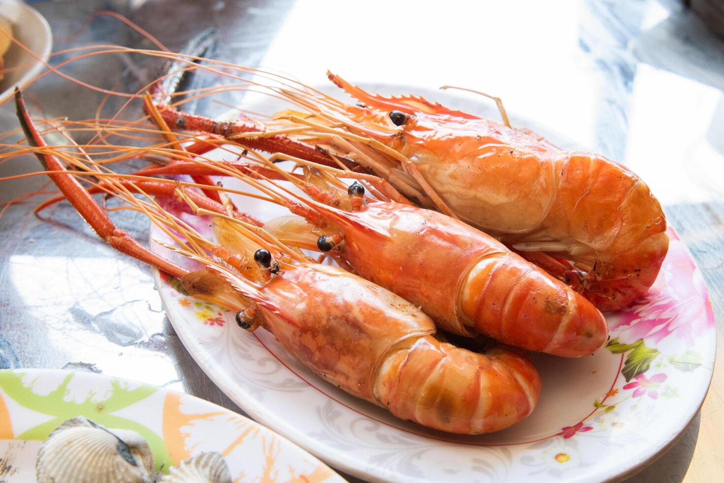 Grilled shrimp on a plate delicious seafood photo