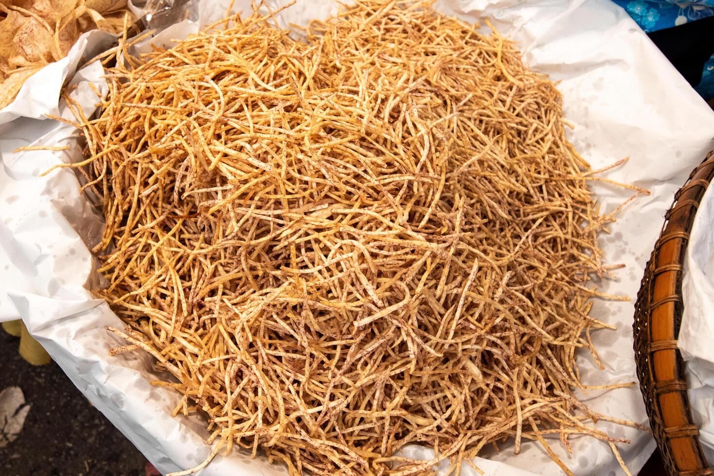 Crispy fried taro strips delicious and tempting to eat. photo