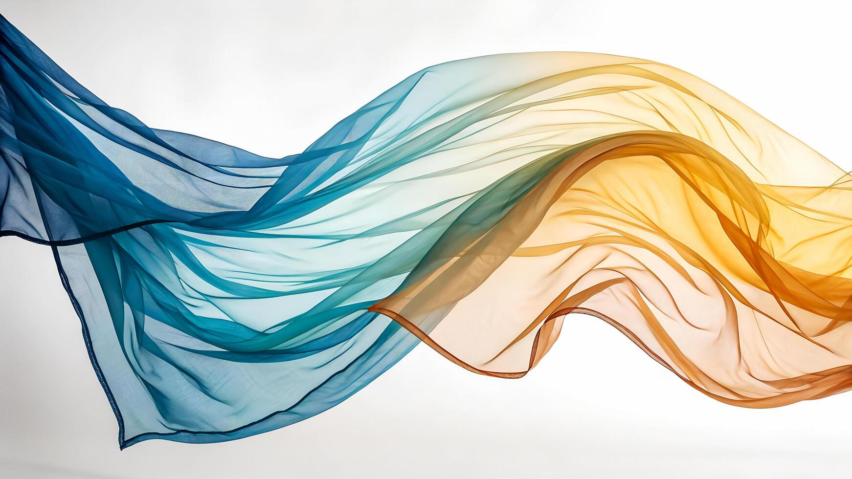 Flowing sheer fabric in gradient shades of blue teal and warm orange against a white background photo