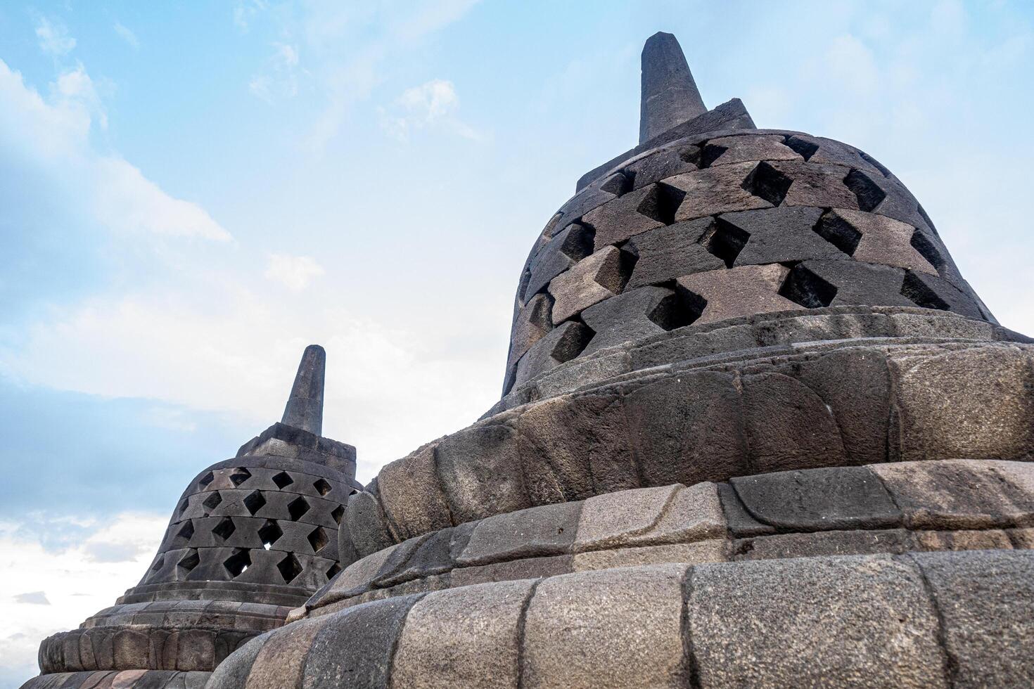 Detailed Close Up of Stone Stupa Structures at Borobudur Temple photo