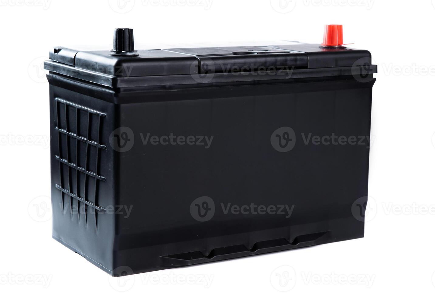 Black car battery with red and black terminals, isolated on white background. Used for automotive power supply and engine starting. photo
