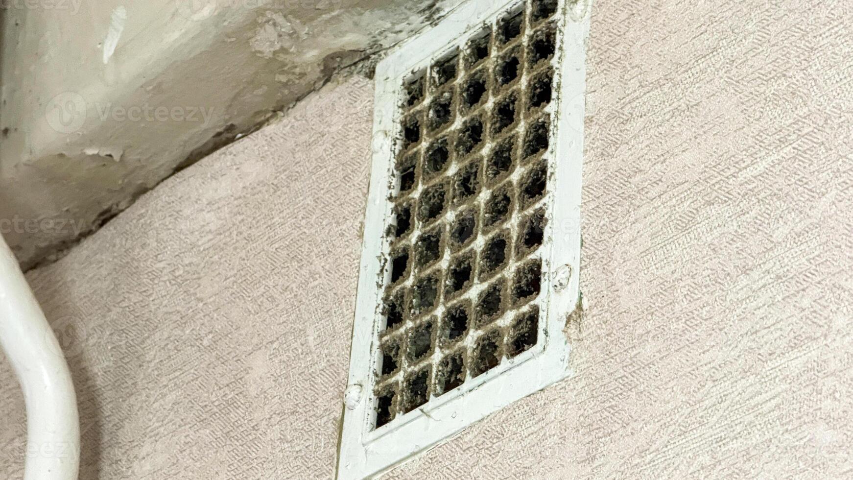 Dusty vintage air vent whispers forgotten secrets, urban decay ambiance, perfect for World Ventilation Day or Industrial Heritage Week photo