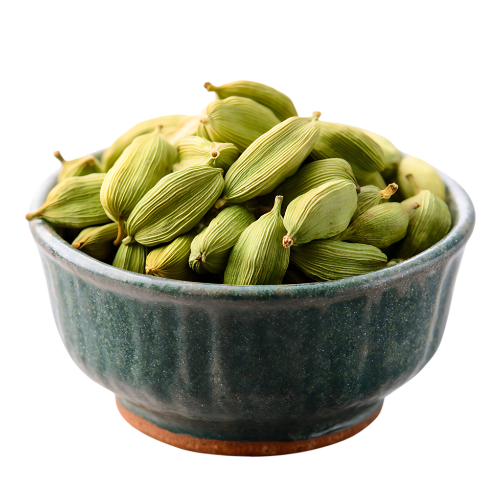 Green cardamom pods in a dark green bowl a fragrant spice png