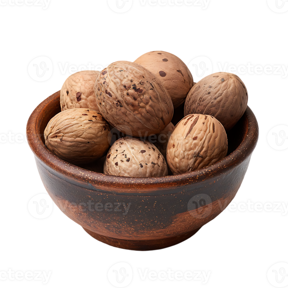 A rustic bowl filled with whole nutmeg seeds ready for use or sale png