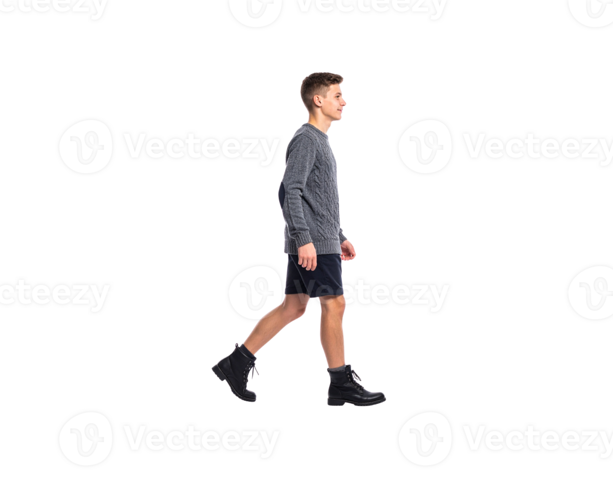 Young Man Walking in Gray Sweater Shorts and Black Boots. png