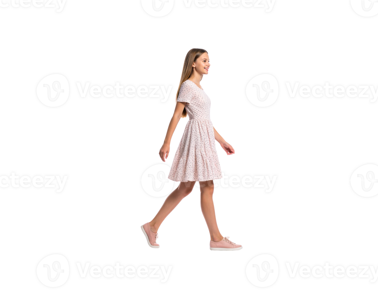 Young Woman Walking in a Polka Dot Dress and Pink Sneakers. png