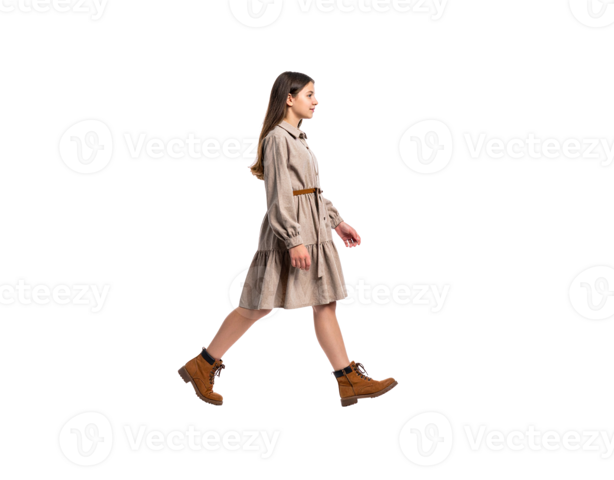 Young woman walking in a beige dress and brown boots side view. png