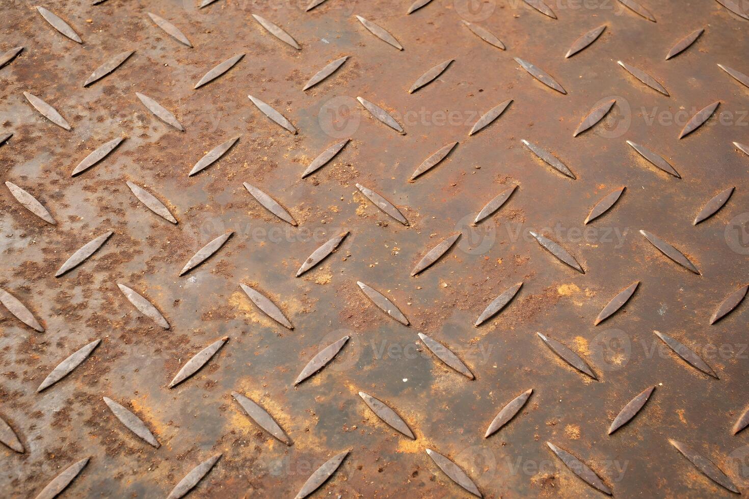 Rusty metal texture with corrosion spots and fine scratches, seamless layout. photo