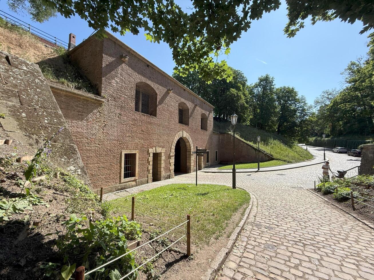 Prague, Czech Republic- June 21,2025 Vysehrad is a historic stone fortress defensive wall with gates photo