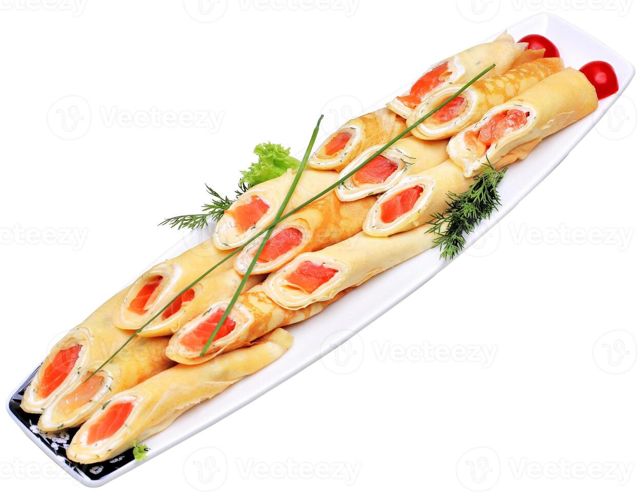 A platter of rolls with salmon and vegetables photo