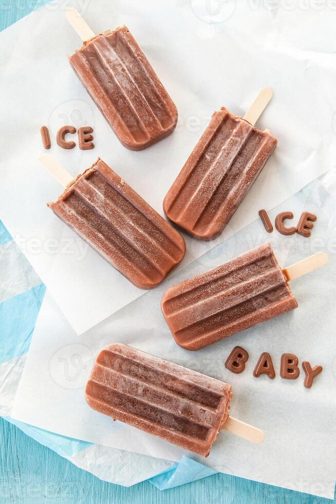 Ice cream popsicles with chocolate ice cream and baby ice cream photo