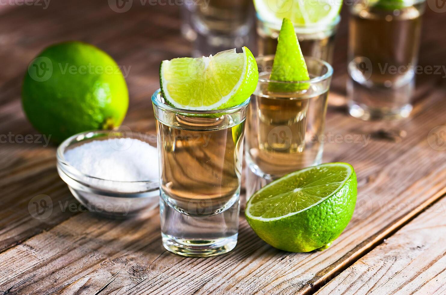 gold tequila with salt and lime photo