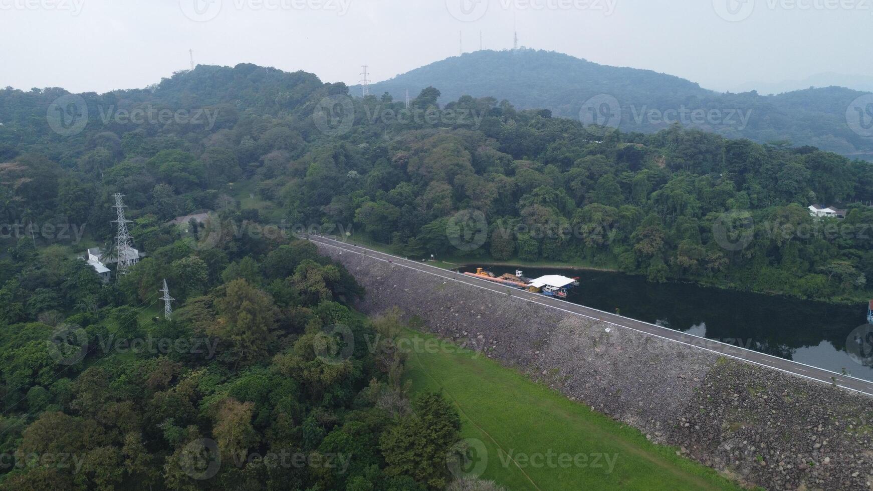 A river flowing through a forested area photo