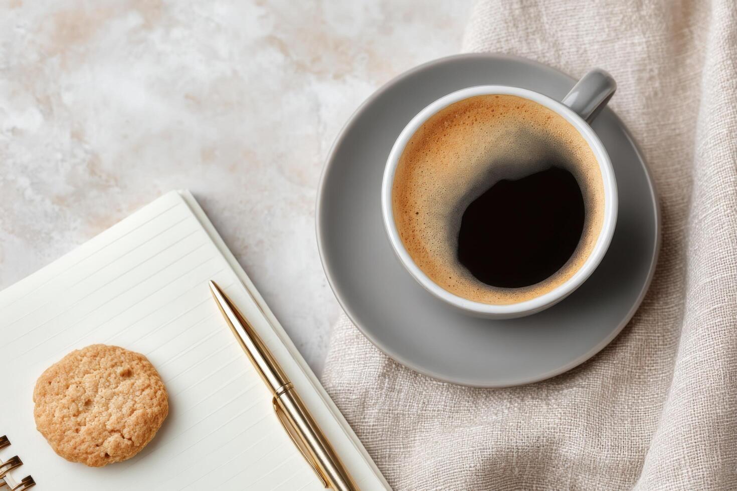 Cozy Morning Coffee Break A Simple Yet Elegant Lifestyle Image Featuring Coffee, Cookie, and Notepad photo