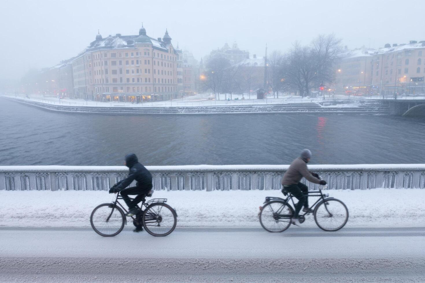 Winter Cycling in Stockholm A Scenic Ride Through Snowy Cityscapes. Witness the beauty of a snow covered bridge, river, and charmi photo