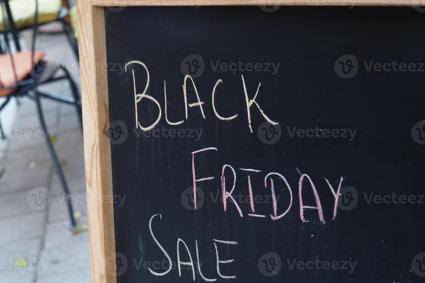 Black Friday sale sign displayed at outdoor cafe photo