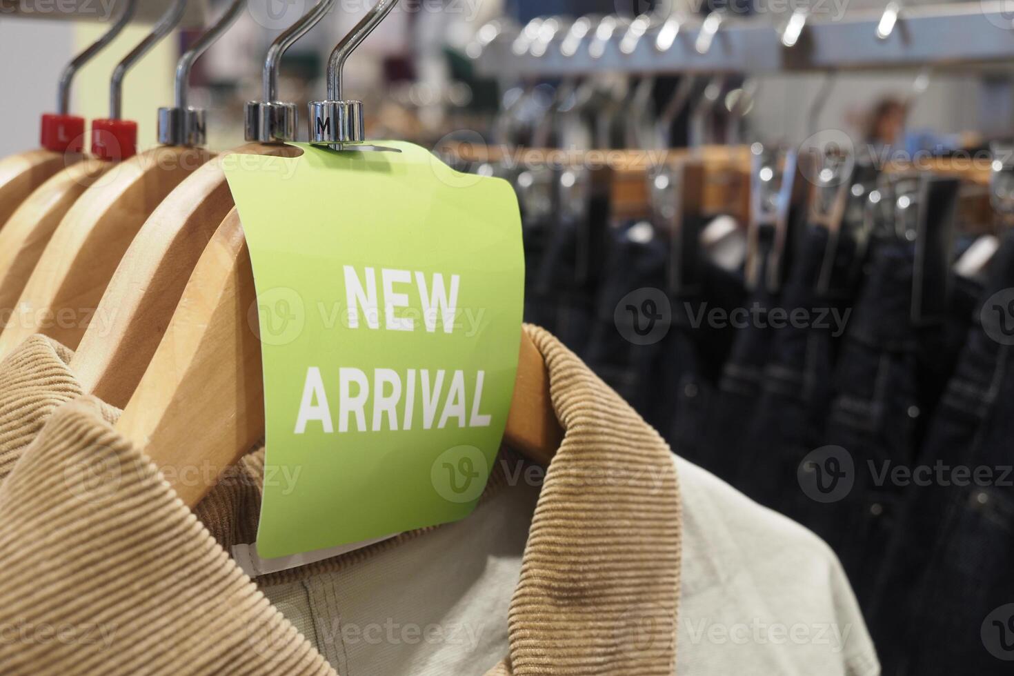 New clothing collection displayed in retail store photo