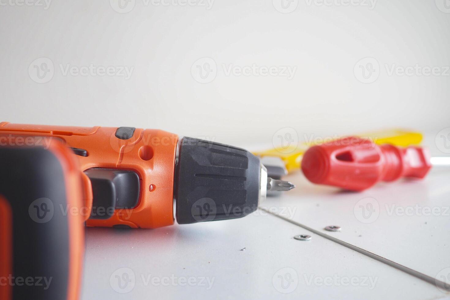Tools arranged on a workbench for home improvement tasks photo