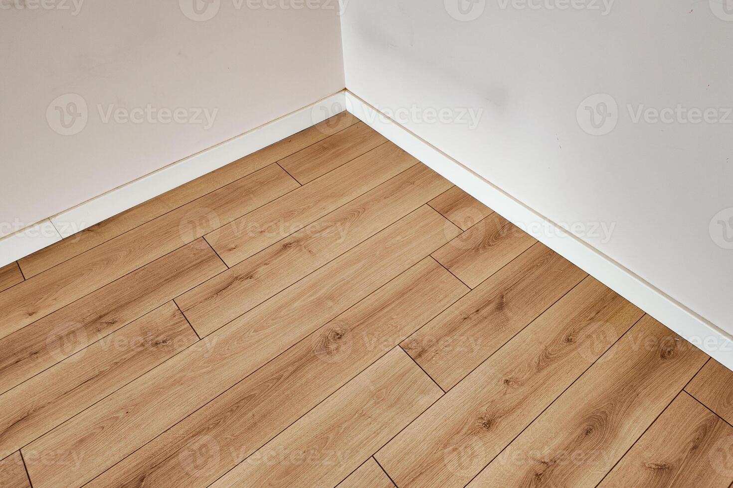 Modern wooden flooring with clean lines in a bright space photo