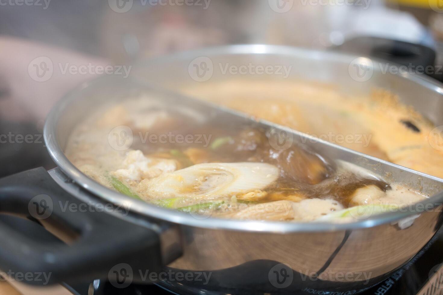 Hot soup Shabu Shabu and Sukiyaki with many vegetables before put beef. photo