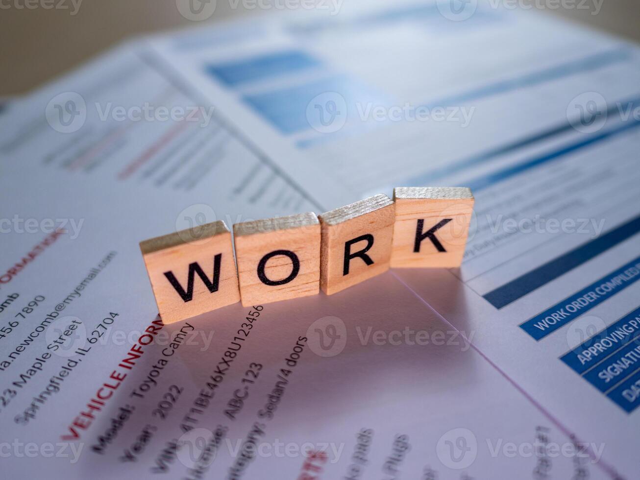 Work on a paper with a scrabble block photo