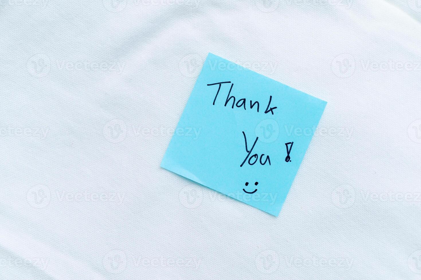Thank you note on white t-shirt photo