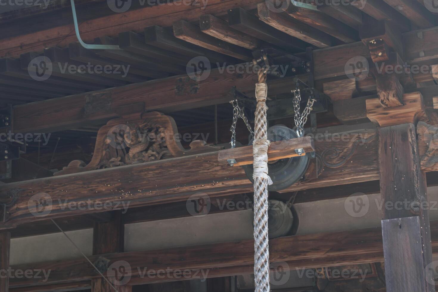 Traditional wooden architecture with lantern and intricate detail. photo