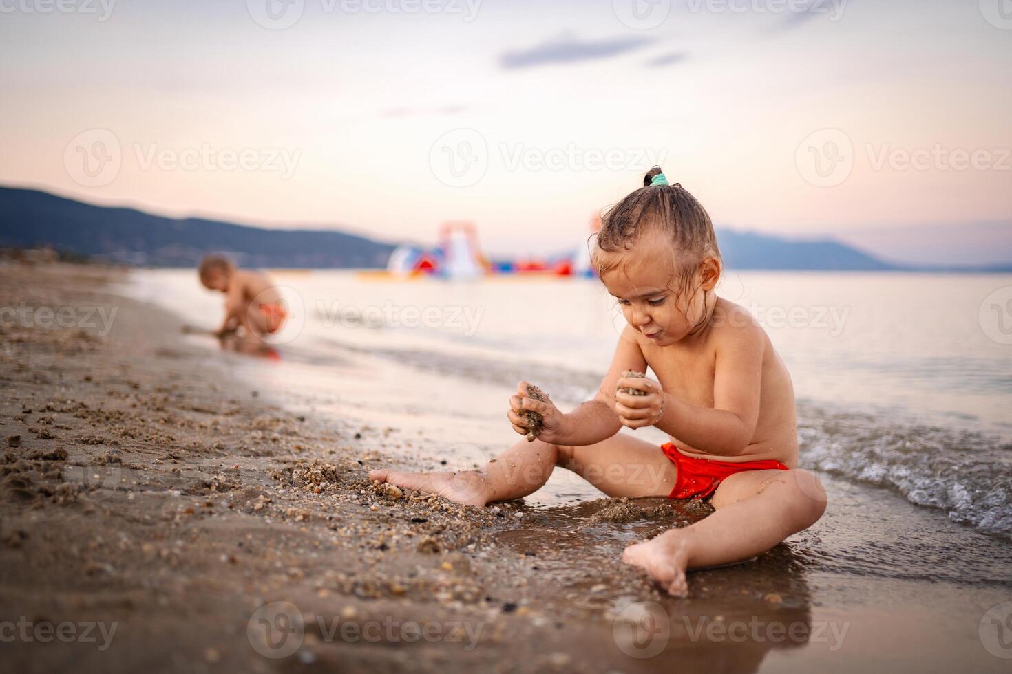 Joyful summer moments by the beach in Greece at sunset photo